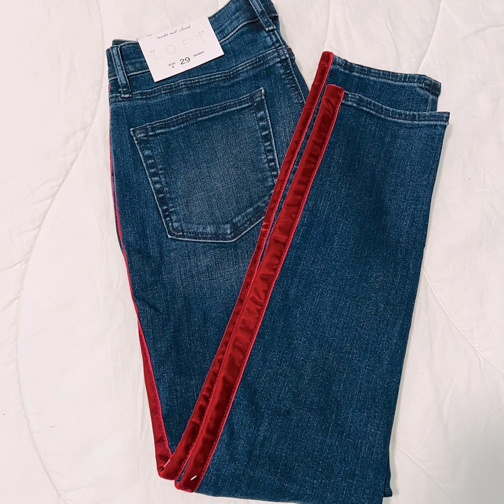 LOFT size 8/29 skinny jeans with maroon velvet strips down legs